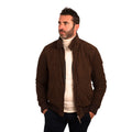 Men's brown suede bomber jacket with zipper, styled over cream turtleneck for modern casual wear