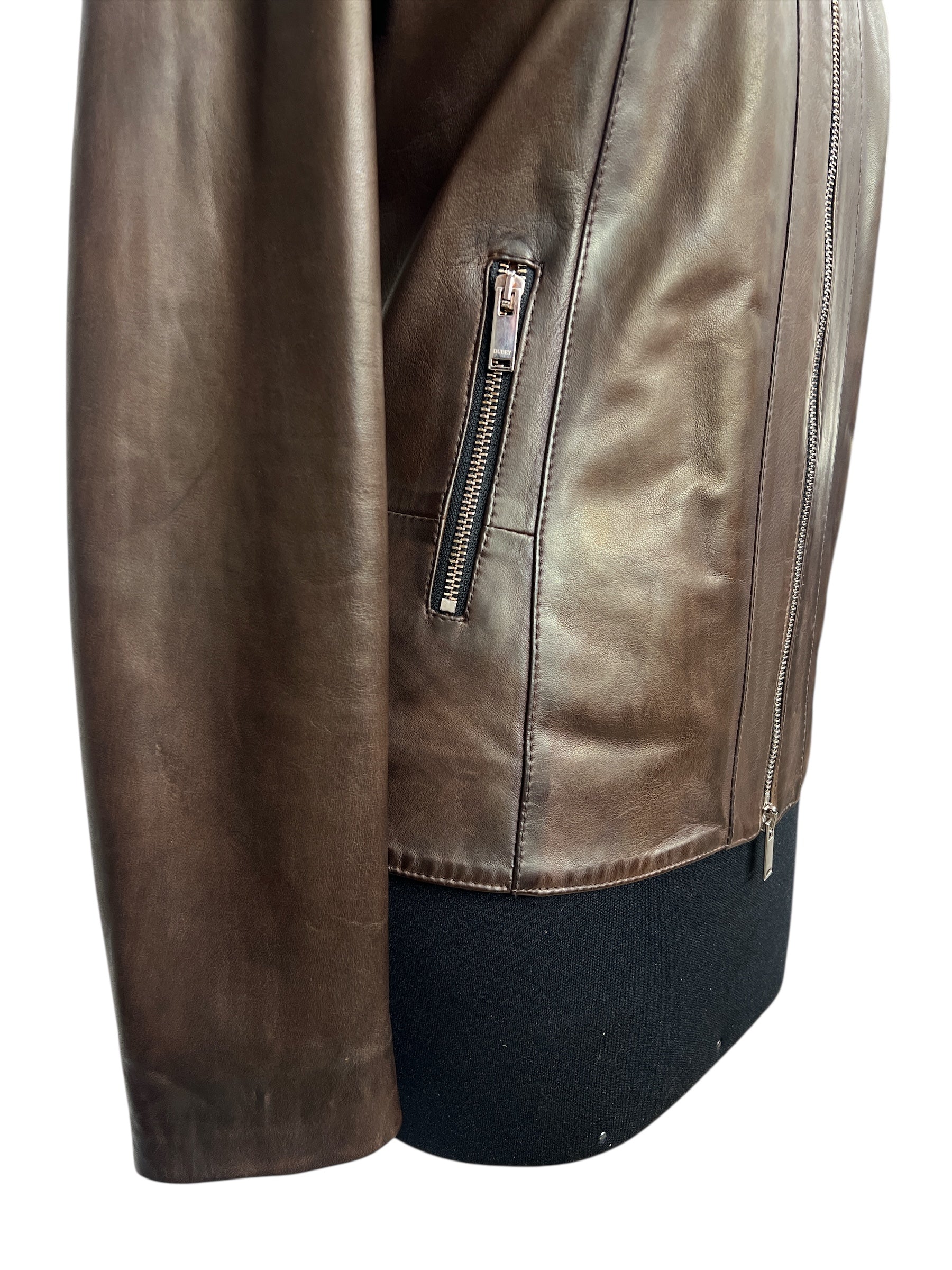 Brown leather jacket with zipper pocket and side zip, stylish and modern design for women
