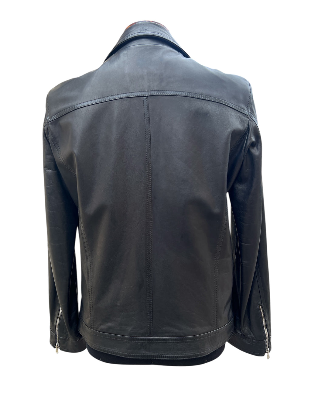 Black leather jacket back view with zipper details and tailored stitching for men's fashion