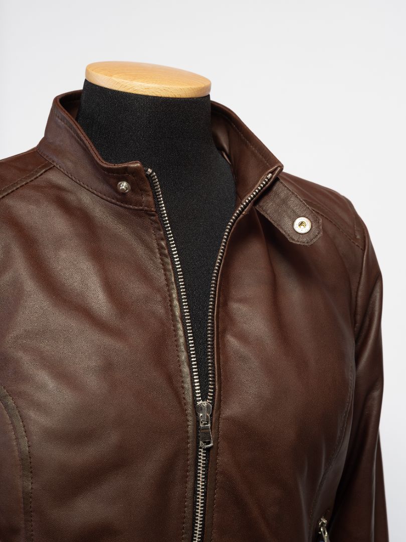 Brown leather jacket with zipper and snap buttons on mannequin, stylish and modern fashion outerwear